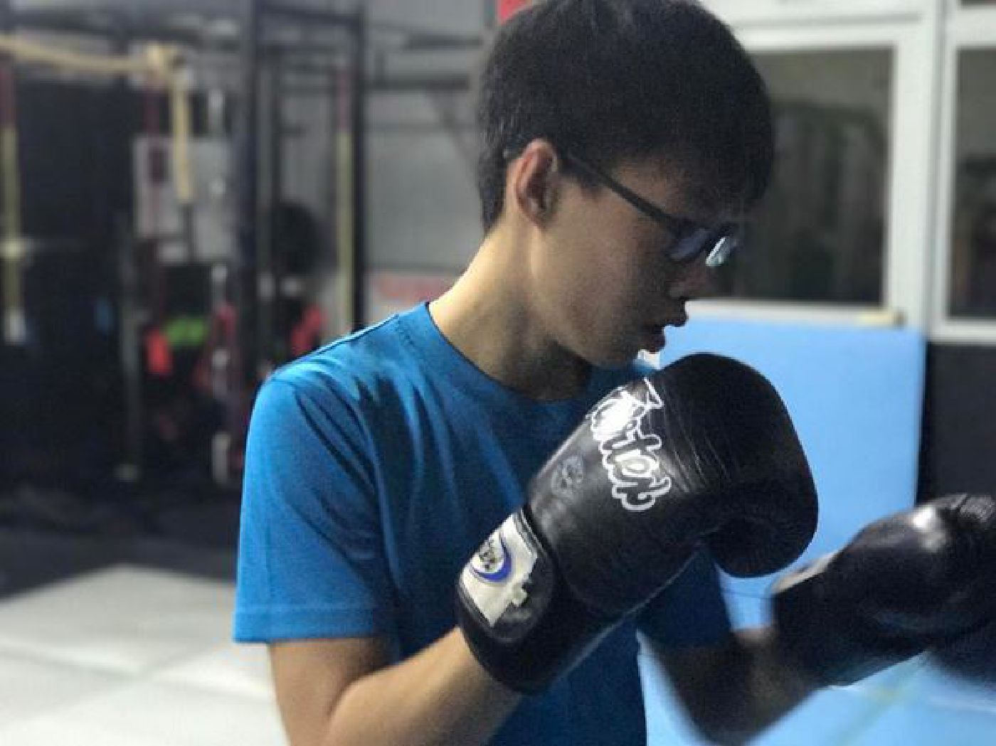 A Muay Thai Singapore West student getting focused and ready for Muay Thai training