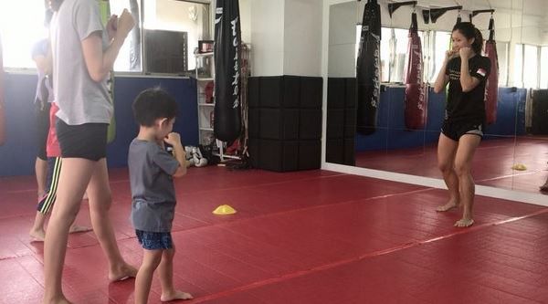 Muay Thai Singapore West kids learning how to adopt proper fighting stance